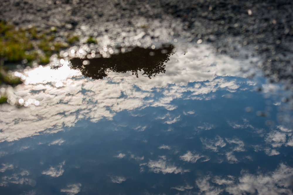 The sky contained in a puddle