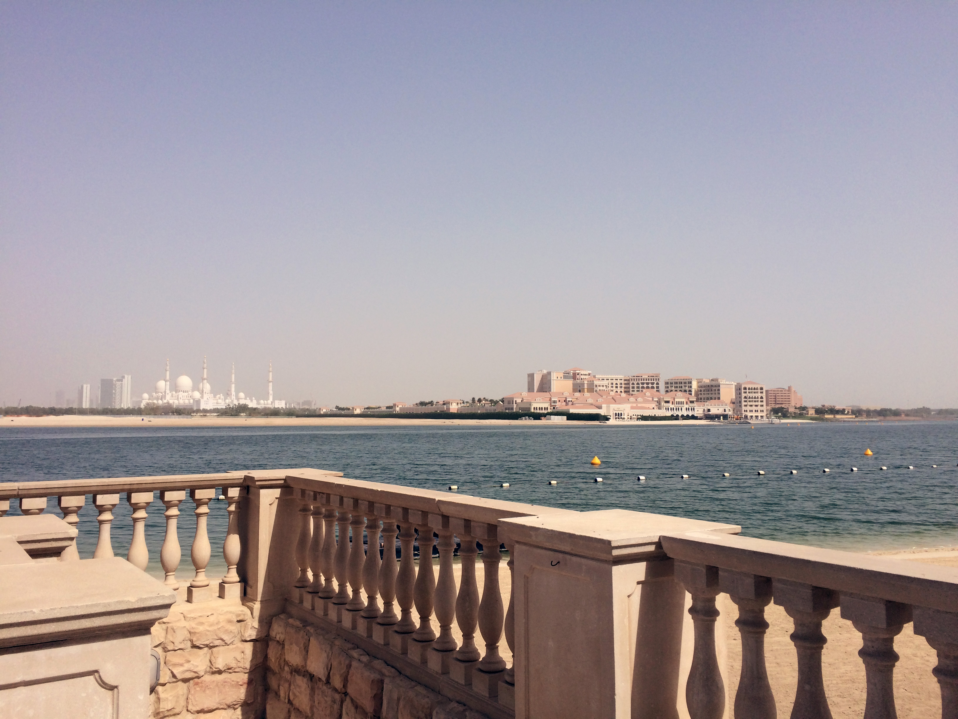 View across the water to the Sheikh Zayed Grand Mosque