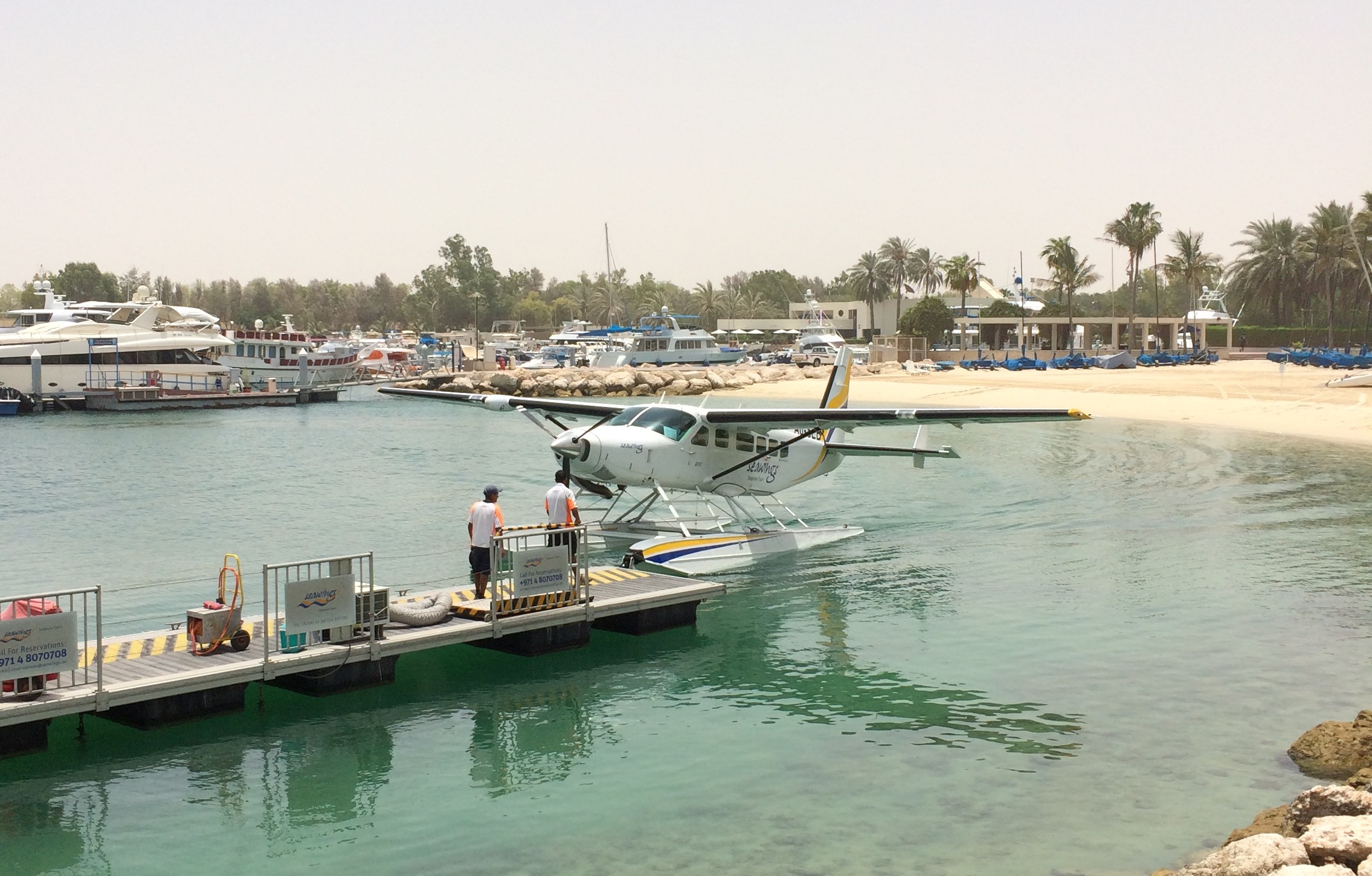 The Jetty watching the seaplane taxi in