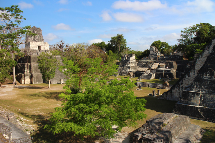The view of Temple II on the left, Temple I on the right and the North Acropolis in between, Tikal